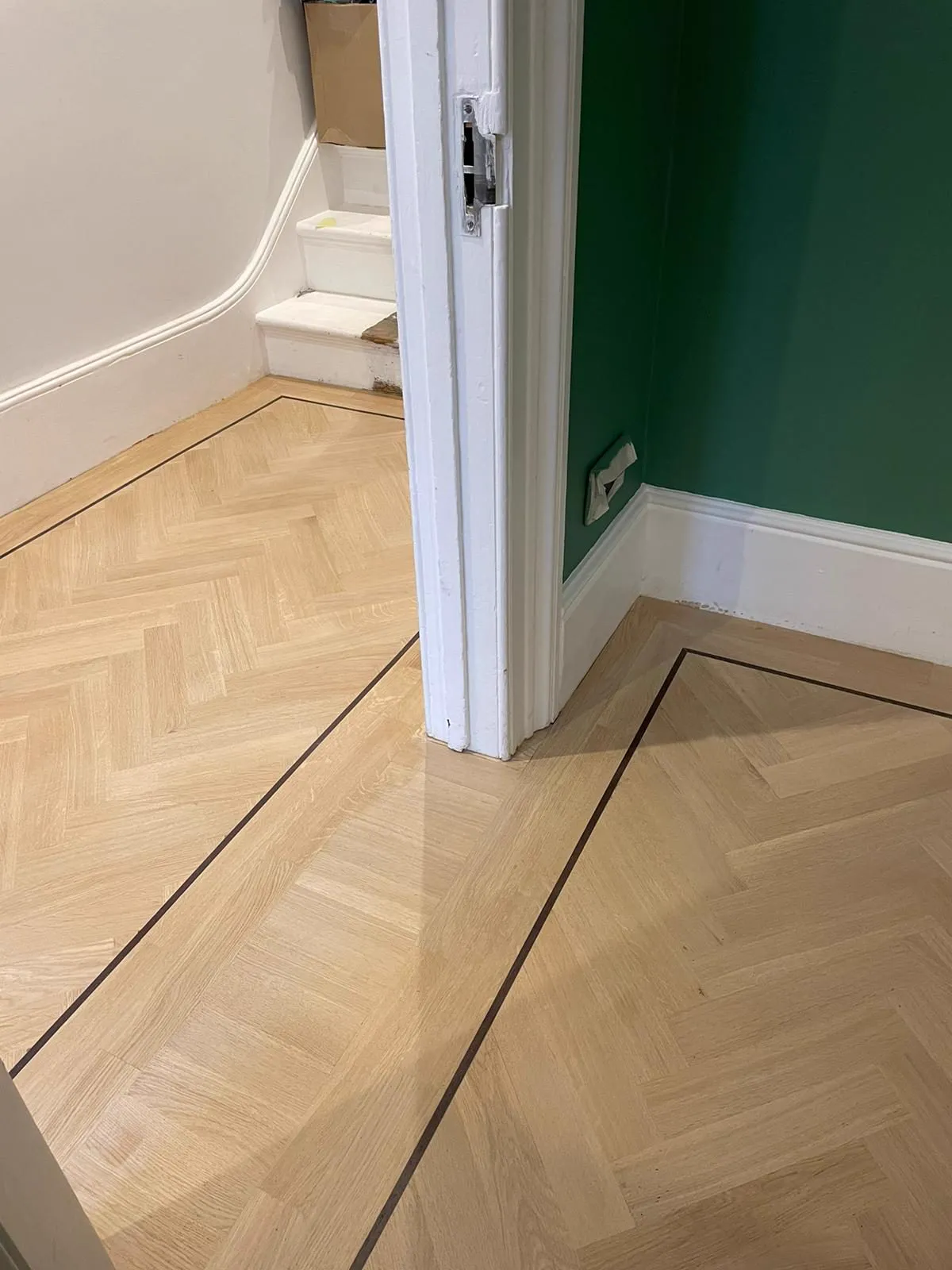 Herringbone parquet floor in a Balham SW12 hallway