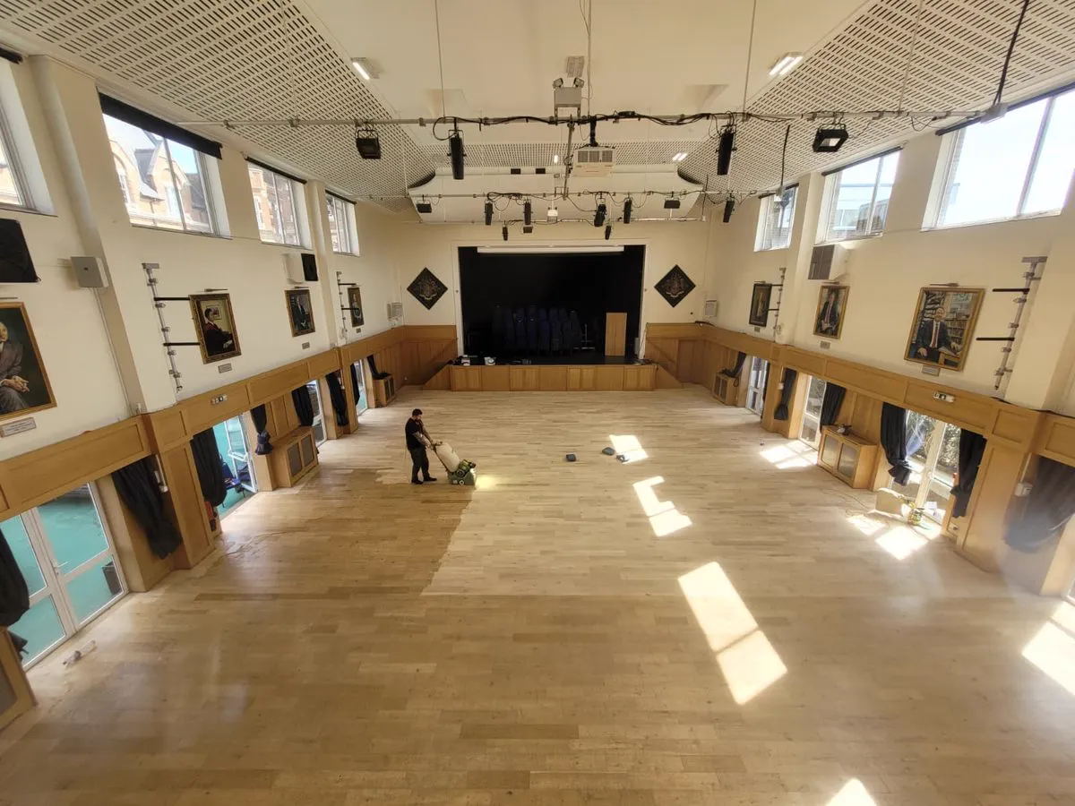 Large commercial wood floor at Emanuel School after sanding
