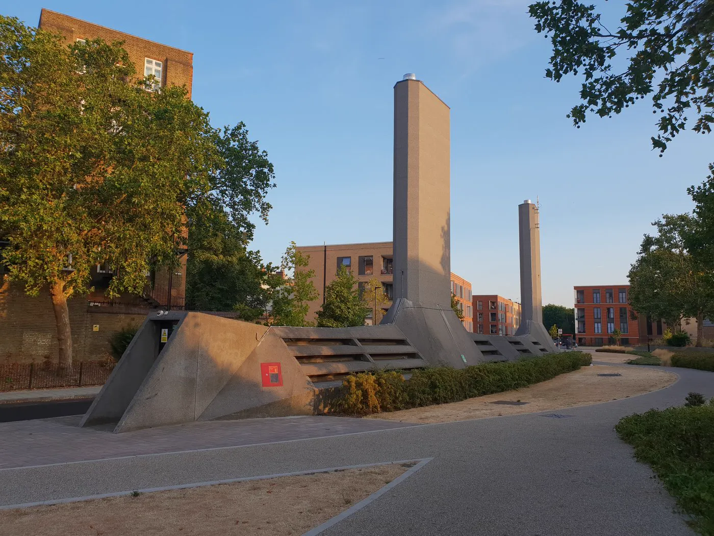The Camberwell Submarine on Akerman Road: concrete vent towers of the underground Myatt's Fields boiler house at golden hour