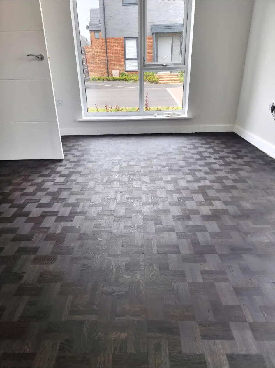 New black finger mosaic parquet floor laid and stained on site in Chipstead CR5 by Howard Naish