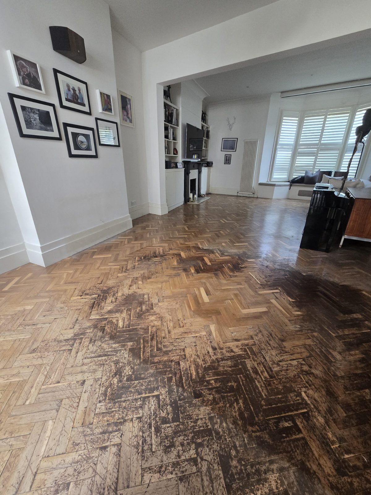 Original herringbone parquet floor in a Clapham SW4 home before restoration