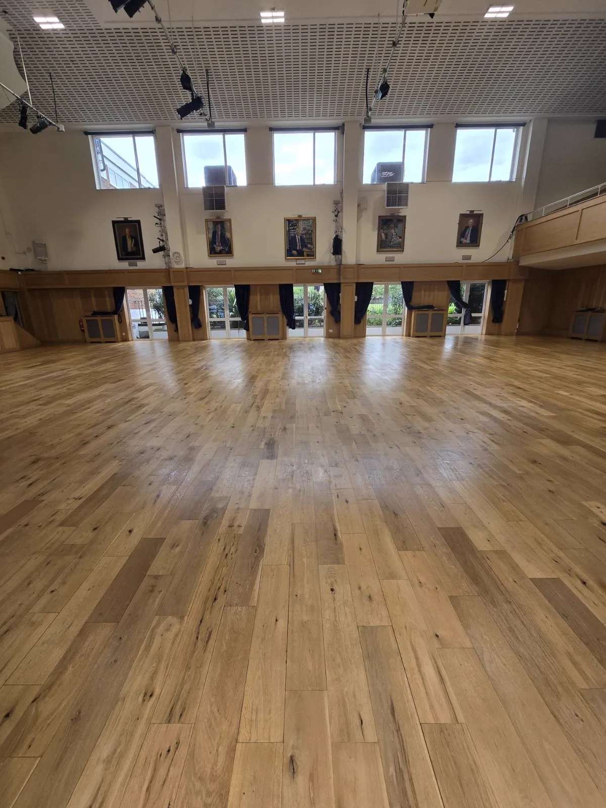Emanuel School hall floor in Battersea after sanding and refinishing by Howard Naish