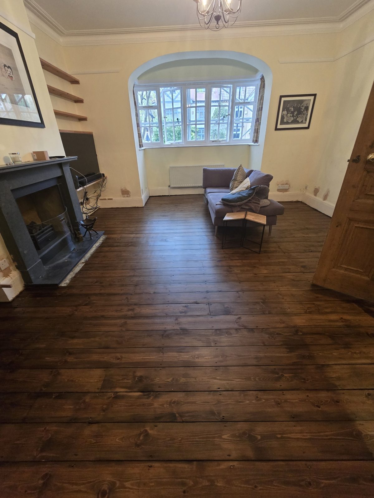 Restored pine floorboards after sanding and finishing