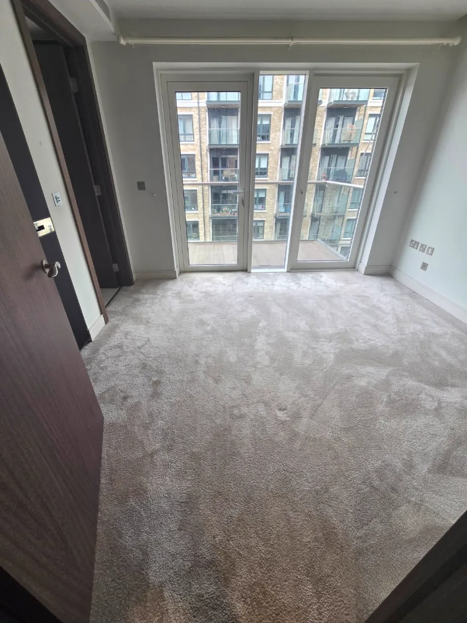 Putney SW15 apartment bedroom with old carpet before the new wood floor was fitted
